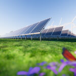 3d rendering of row solar panel in green field with blue sky background to show converting sunlight energy to electric energy.